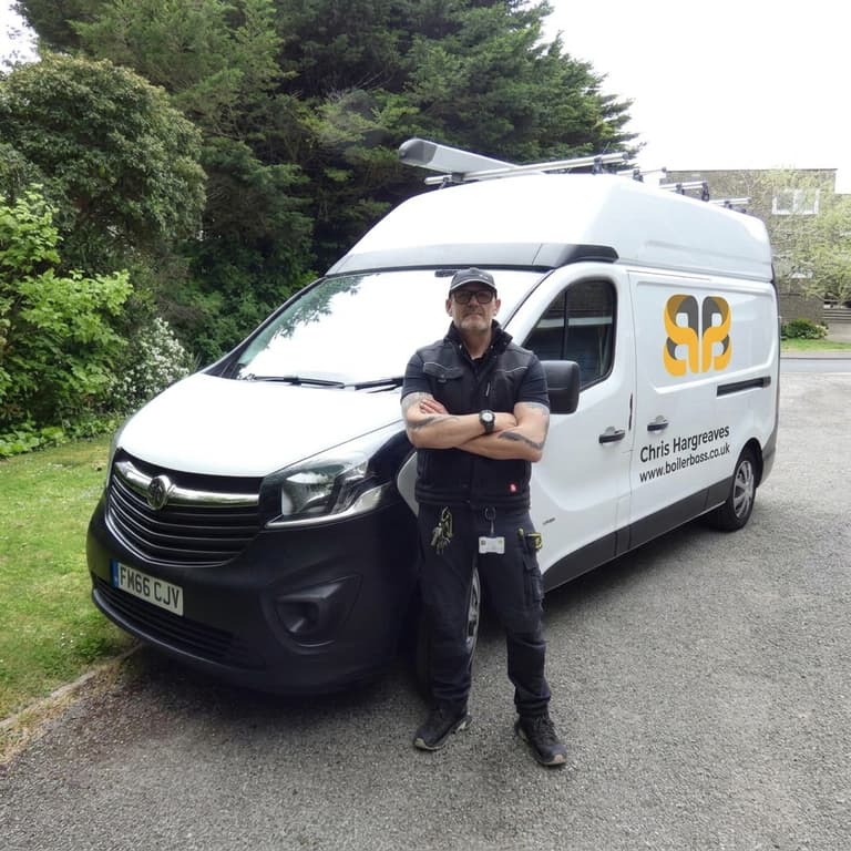 Chris Hargreaves with the branded Boiler Boss van