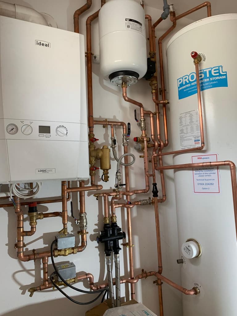 New boiler and hot water cylinder installed by Boiler Boss